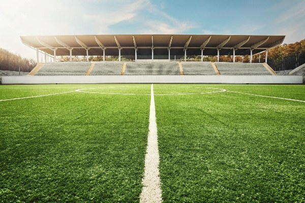 Is professional football (soccer) ever played on fake turf?