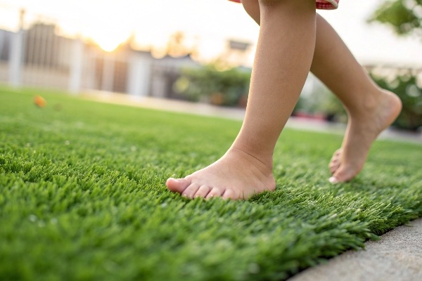 Walking barefoot on artificial grass