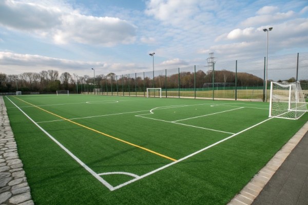 A detailed view of the buffer zone and goal area of a mini football field