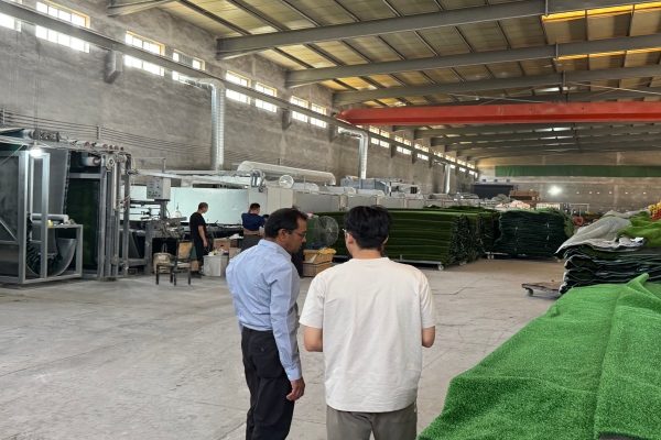 Inspecting artificial grass factory production line