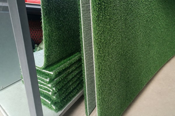 What is turf that allows grass to grow through?